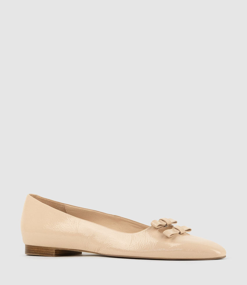 EVAINE Double Bow Flat Pump in Nude Crinkle Patent - Edward Meller