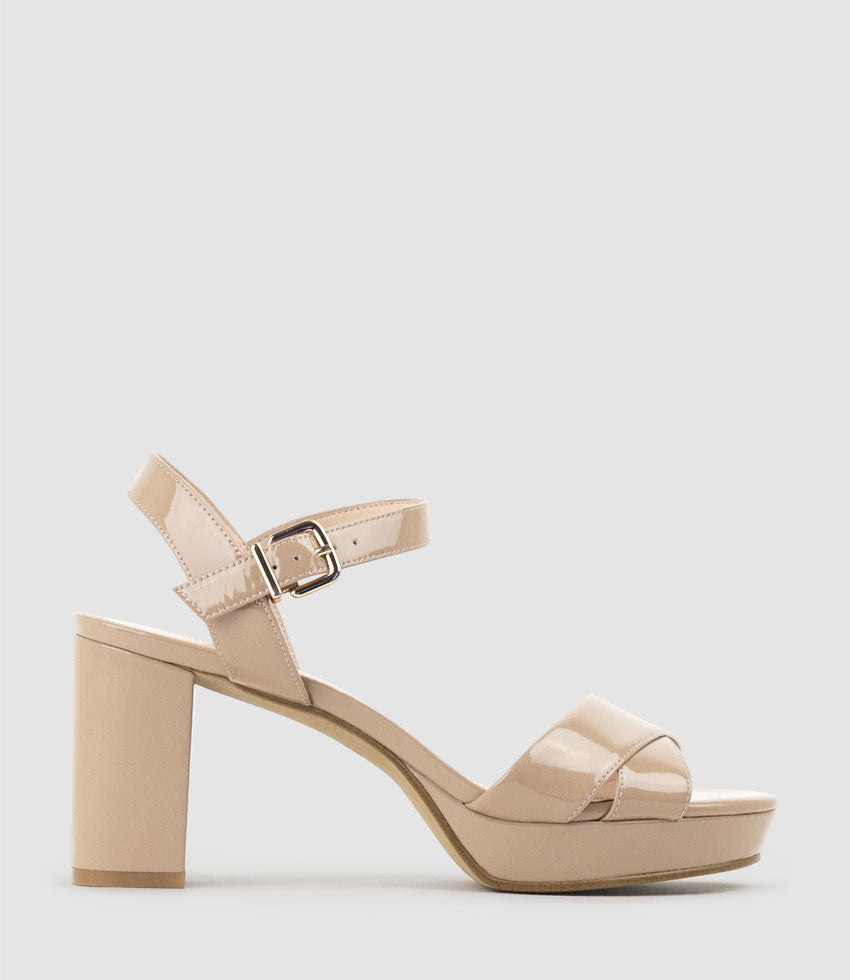 ROWAN80 Asymmetrical Platform Sandal in Nude Patent - Edward Meller