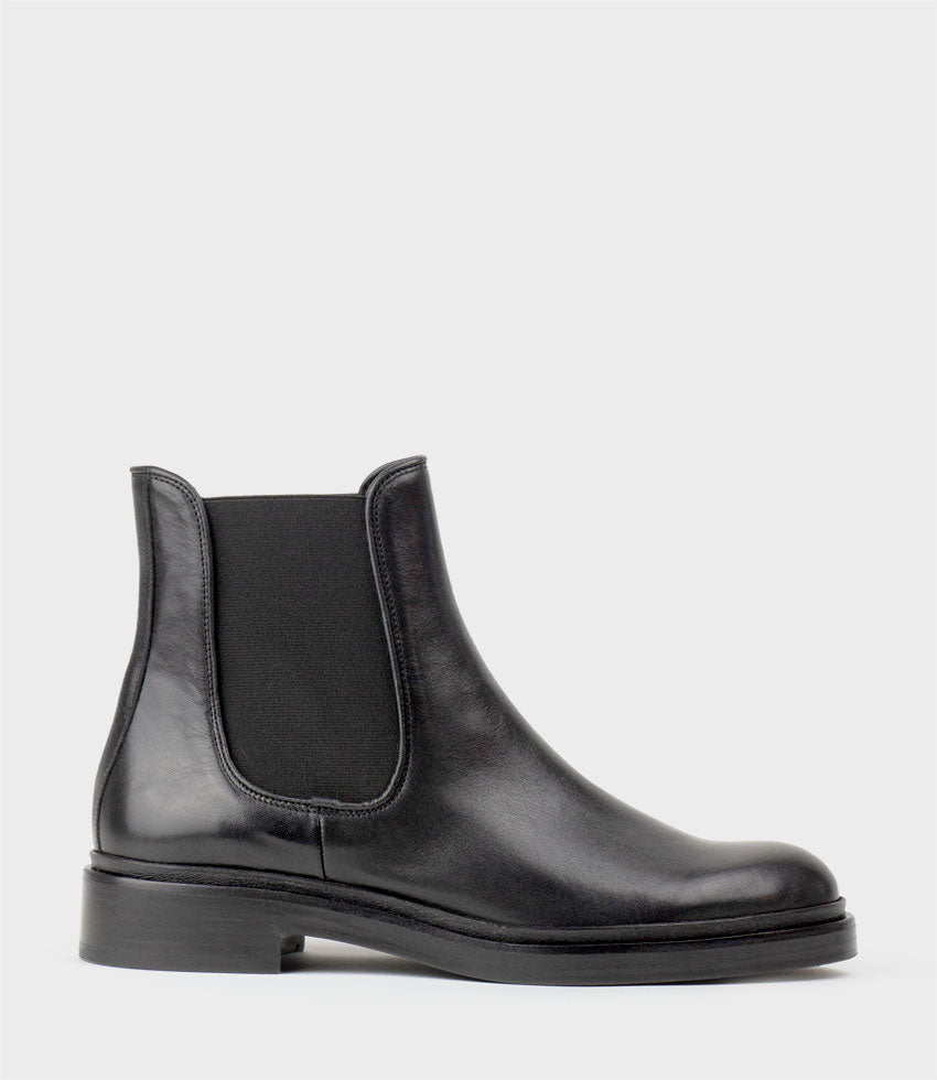 PRIMROSE Knee Boot on Rubber Heel in Black - Edward Meller